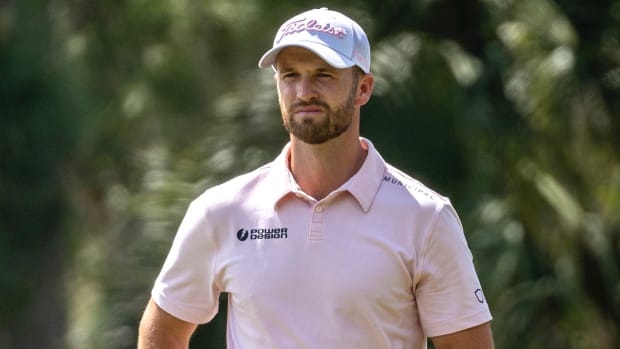 Wyndham Clark waits to play on the 3rd green during the final round of THE PLAYERS Championship golf tournament. Mandatory Credit: